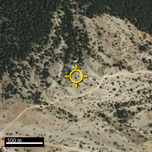 Aerial photograph of Peña Verna, pin marked.