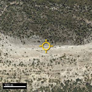 Aerial photograph of Aguila, pin marked.