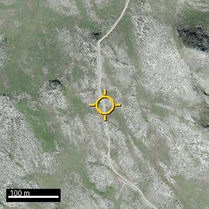 Aerial photograph of Roadside nr. Quirós (south), pin marked.