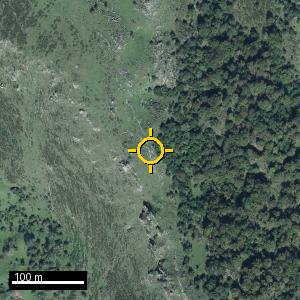 Aerial photograph of Pico de los Pozos de Llaviegu, pin marked.